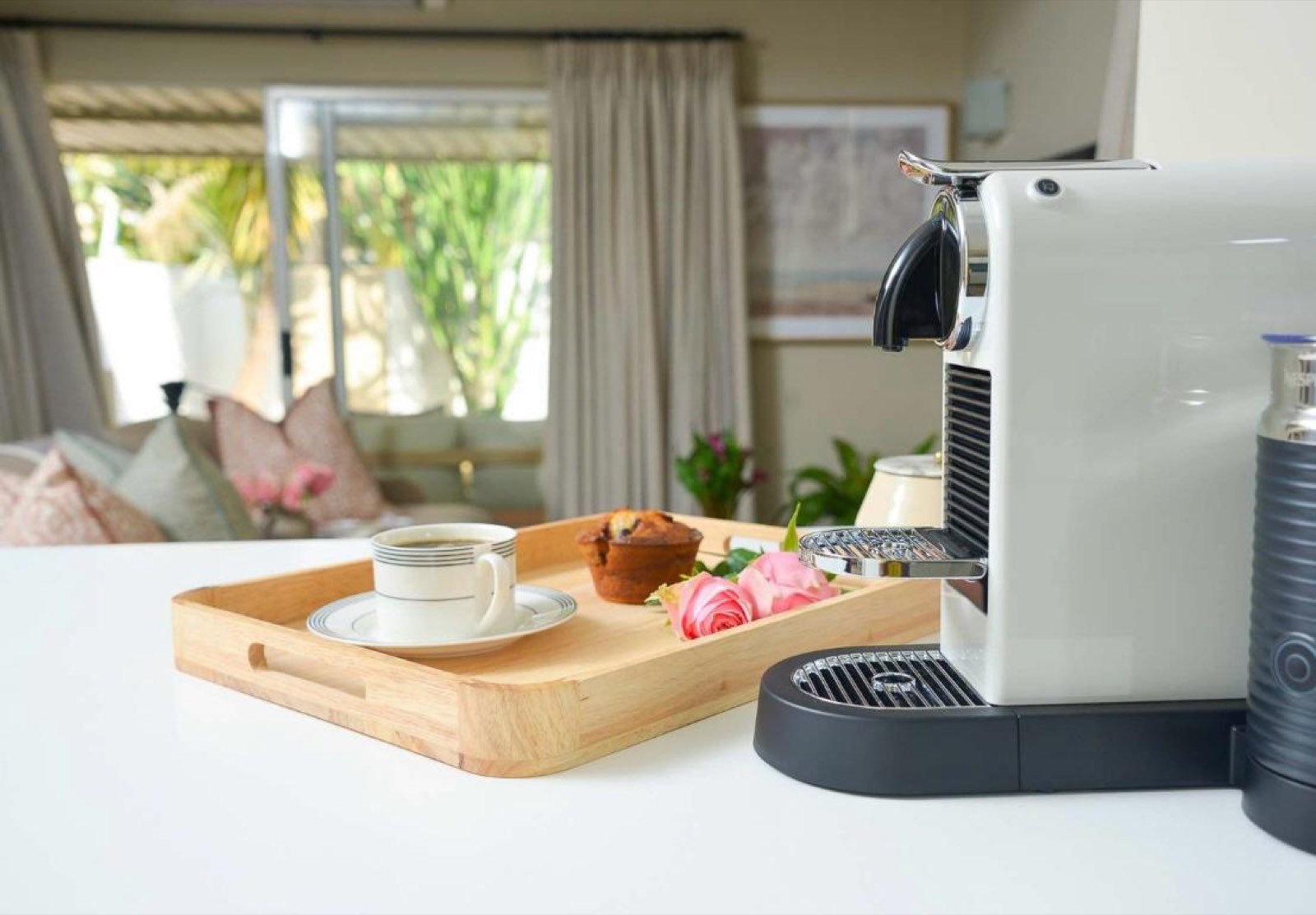 The Nespresso machine and welcome tray on the kitchen counter